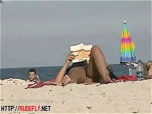super-fucking-hot honeys filmed lying on a naturist beach